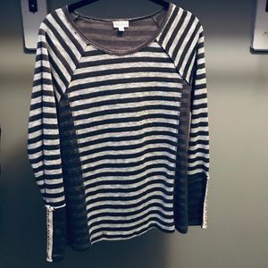 Boutique sweater with unique sleeve embellishment